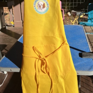 Yellow Apron - Clumber Spaniel Club of Southern California Logo
